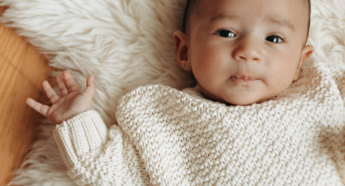 baby_boy_in_squiggle_knit_sweater_in_oatmilk.jpg